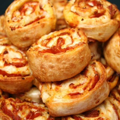 Easy Vegan Pizza Rolls for Game Day Snacking 4 a plate of vegan pizza rolls